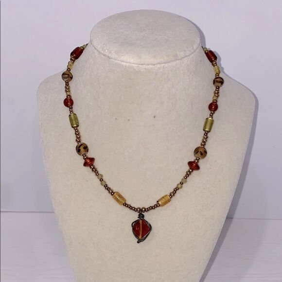 Vintage Boho Beaded Necklace with Drop Dangle Caged Bead Brown and Gold Accents - Picture 1 of 11